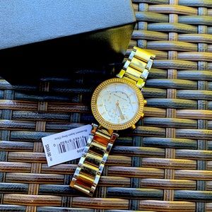 Michael Kors silver and gold tone watch.